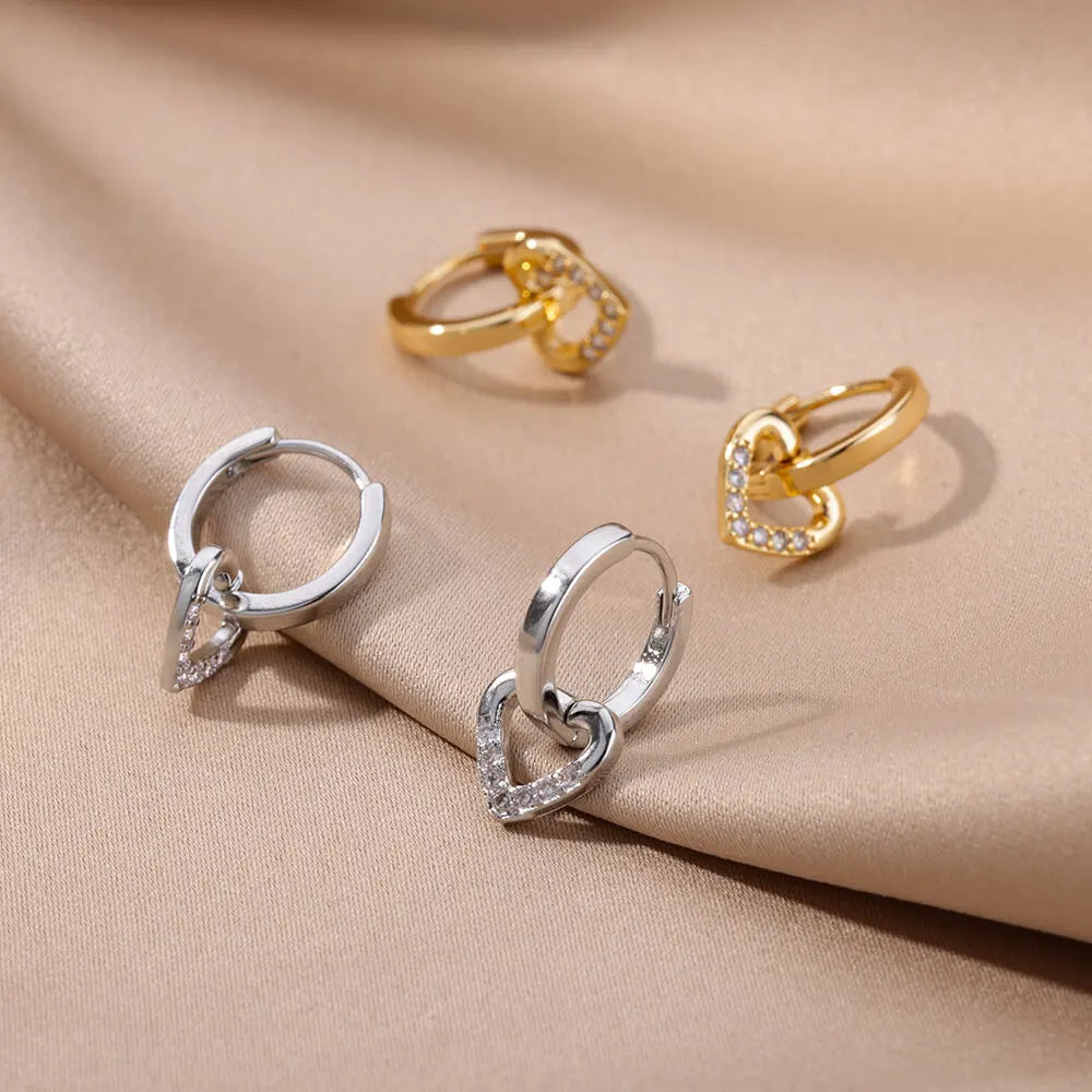Hollow zircon heart earrings