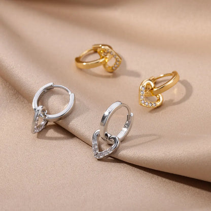 Hollow zircon heart earrings
