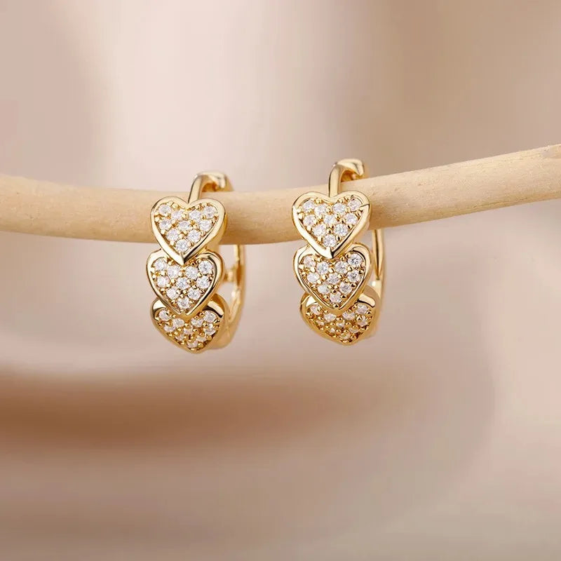 Hollow zircon heart earrings