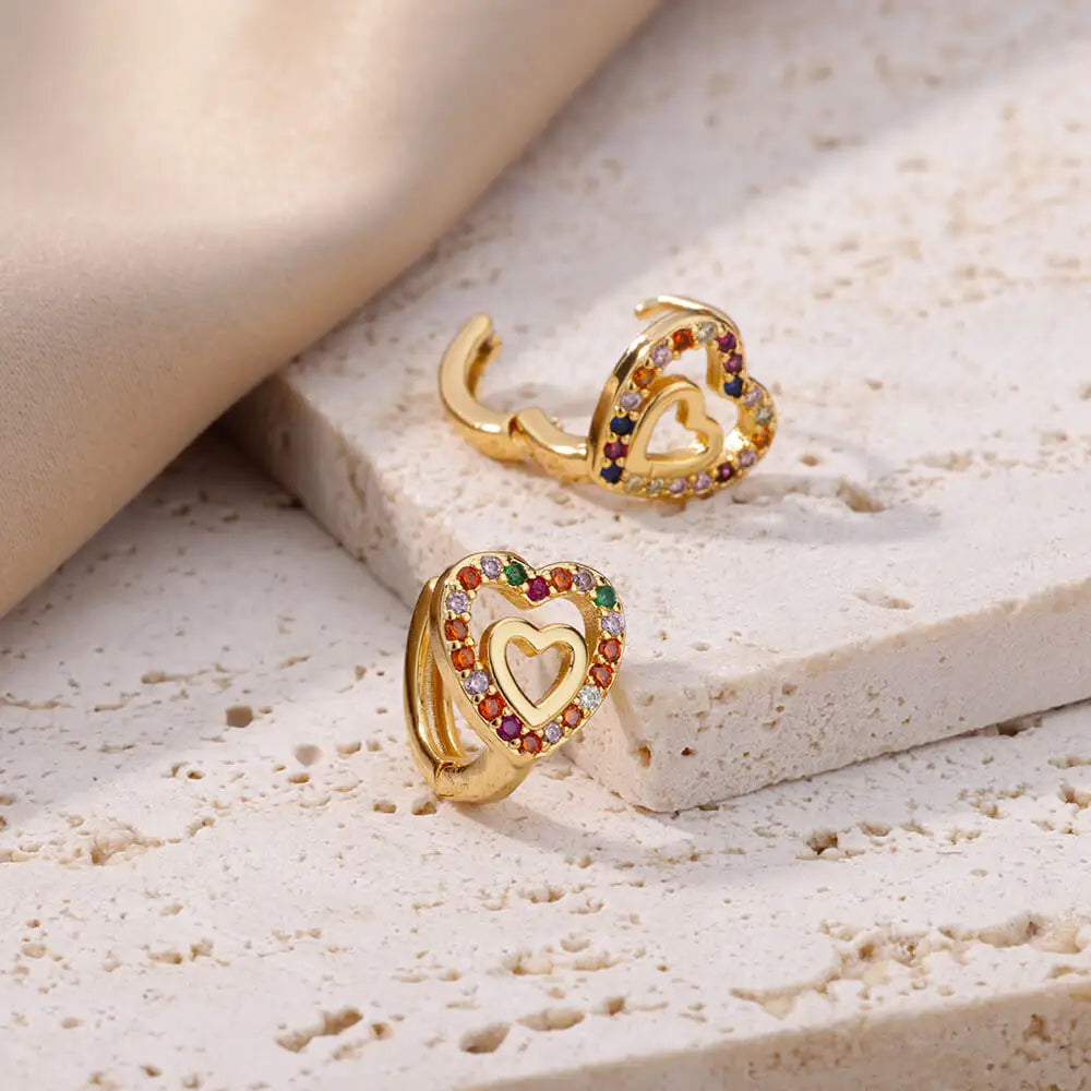 Hollow zircon heart earrings