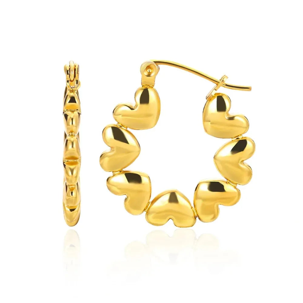 Hollow zircon heart earrings