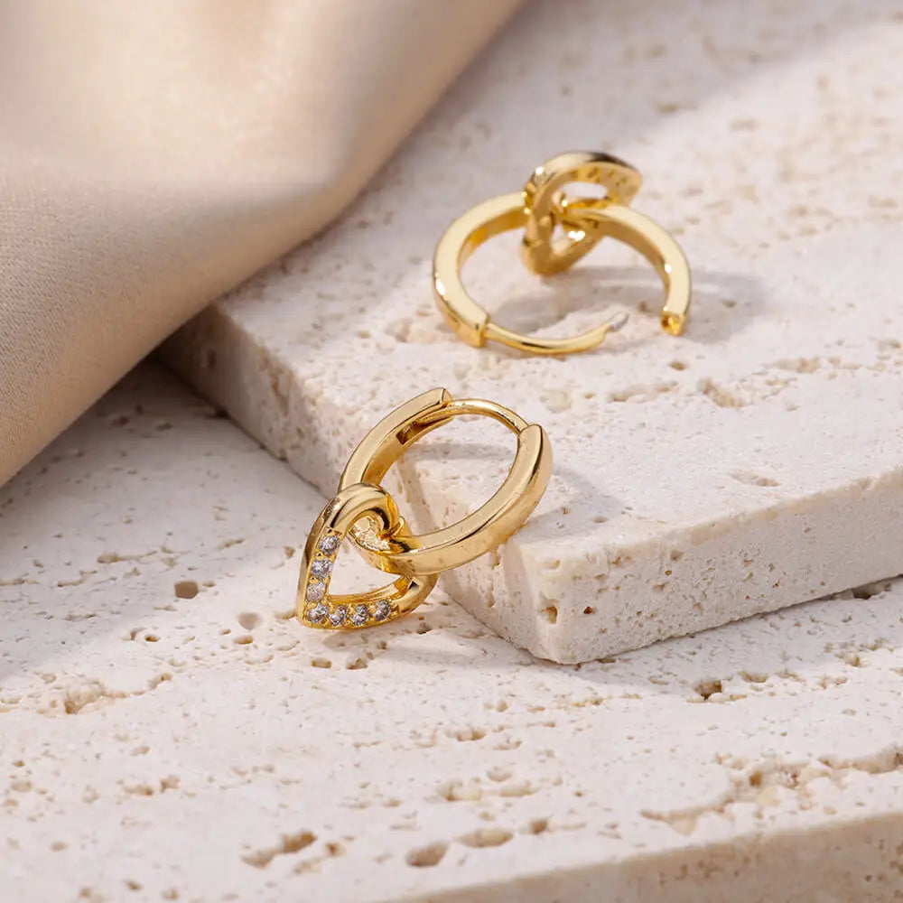 Hollow zircon heart earrings